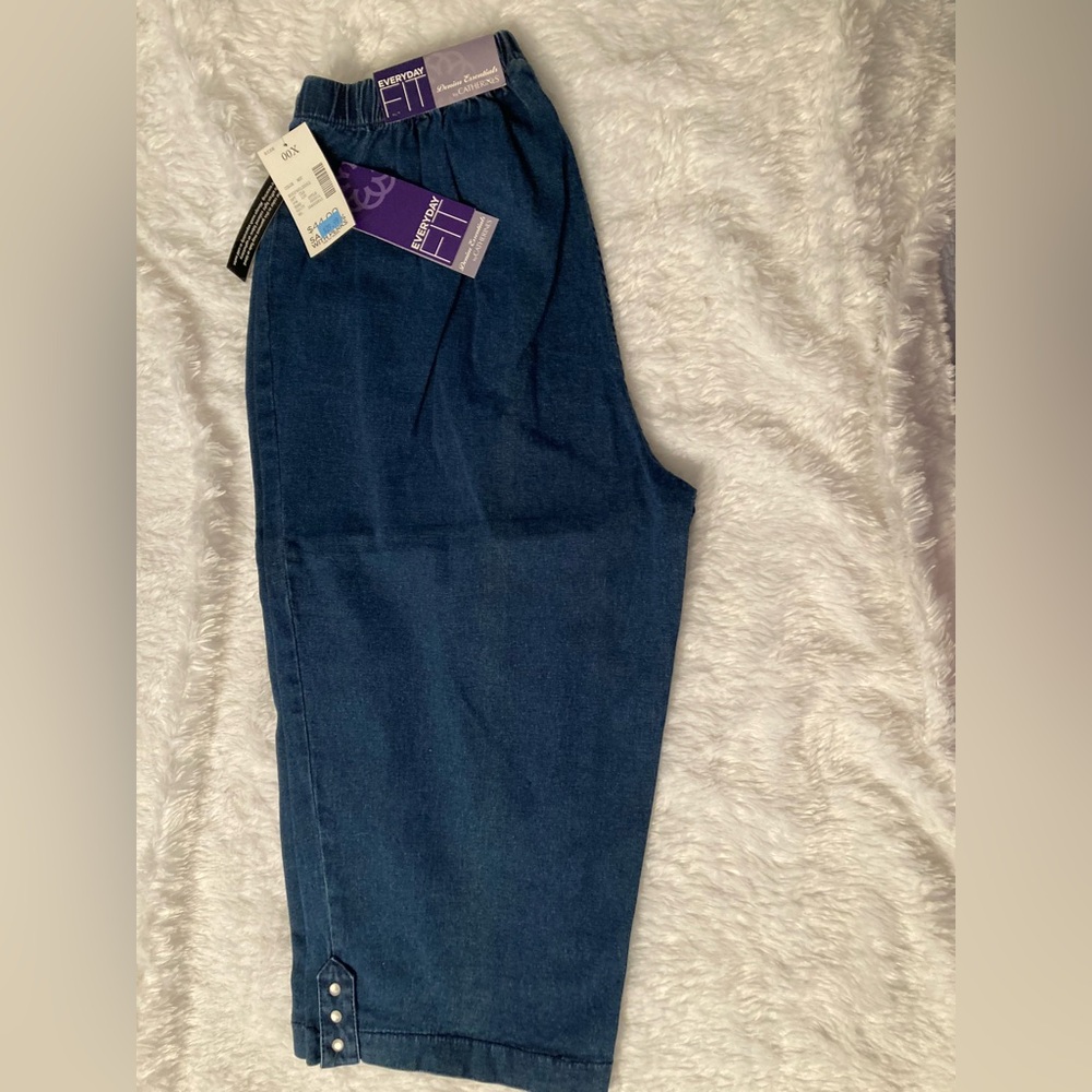 NWT’s.  Catherines Everyday Fit Denim Capri in Blue.  Size 00X (12/14)